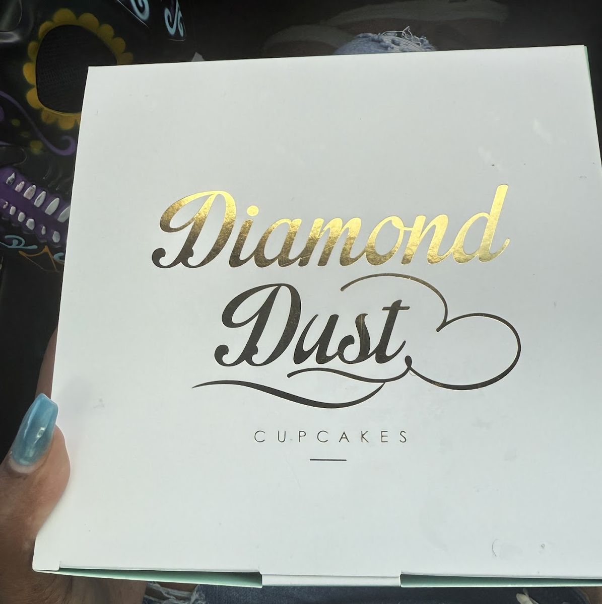 The signature mint and gold Diamond Dust Cupcakes box